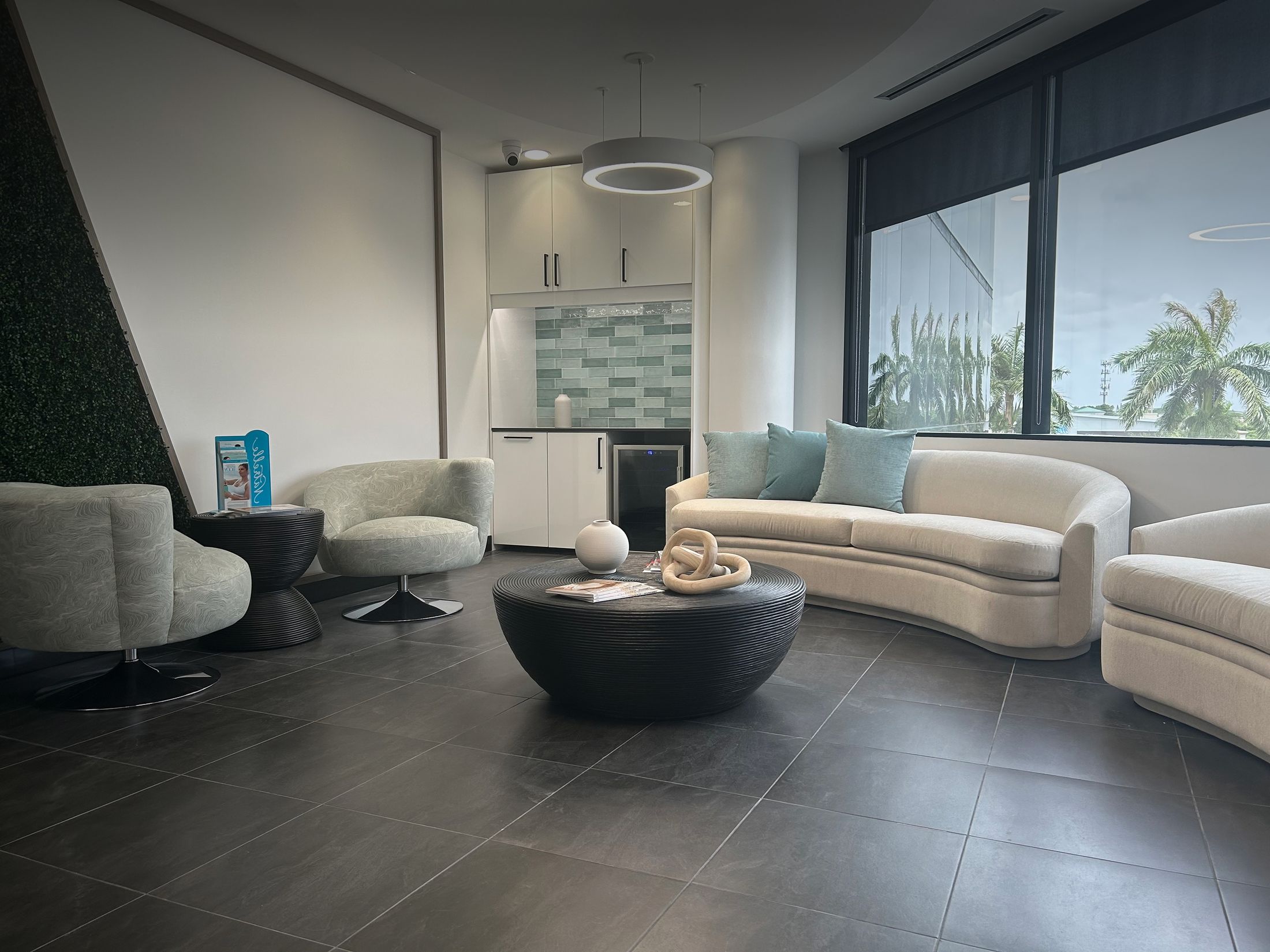 Modern lounge area with comfortable seating and decor.